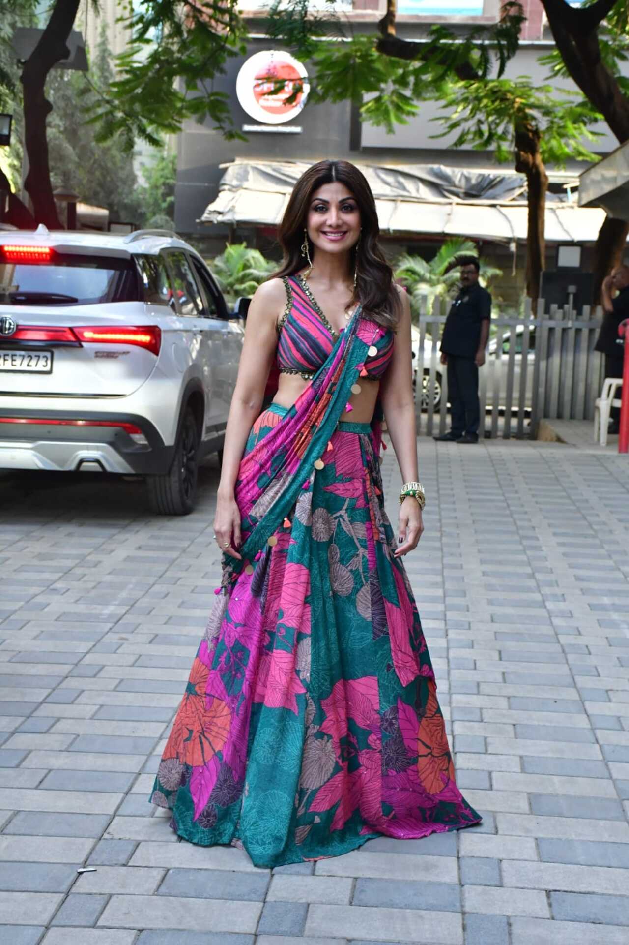 Shilpa looked gorgeous in a multicoloured lehenga. She posed for the paparazzi during the promotion